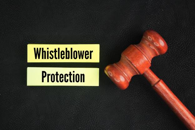 Whistleblower Protection next to gavel - Whistleblower Protection